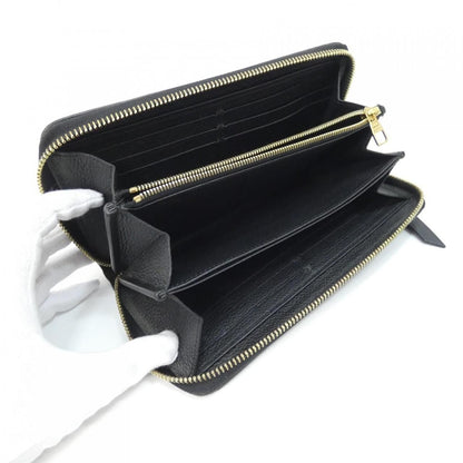 Louis Vuitton Monogram Empreinte Zippy Wallet — view 9