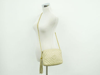 Authentic Chanel Coco Mark Tassel Shoulder Bag Pochette Lambskin Leather Beige