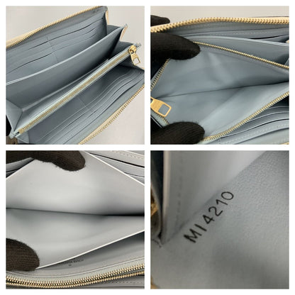 Louis Vuitton Taurillon Portefeuille Comet L-Shaped Zipper Long Wallet M69504