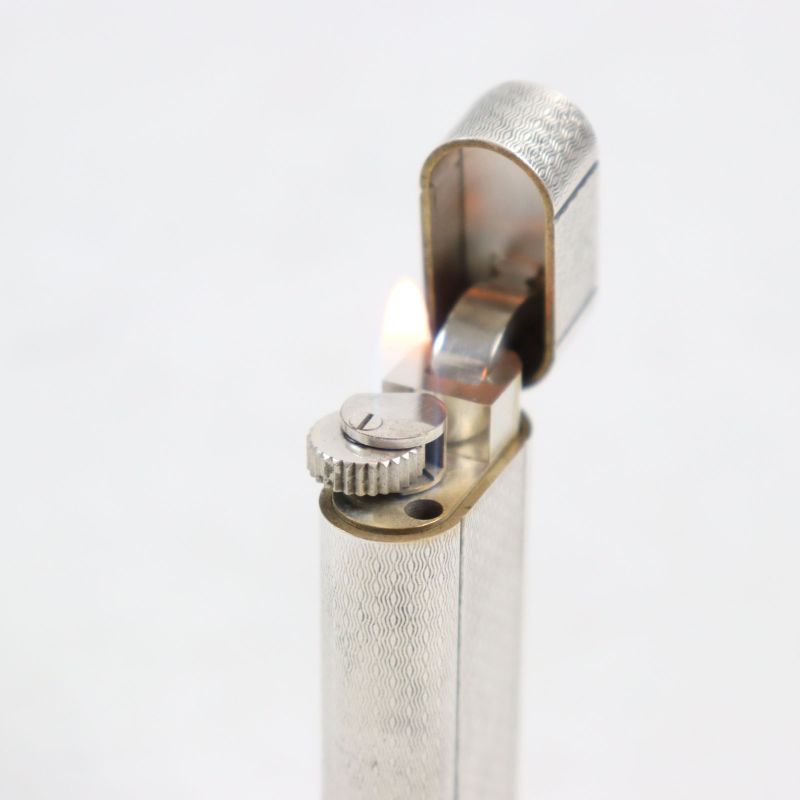 Cartier Allover Oval Roller Lighter Silver Men's Women's