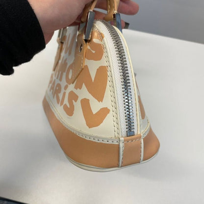 Louis Vuitton Alma Oriental Handbag