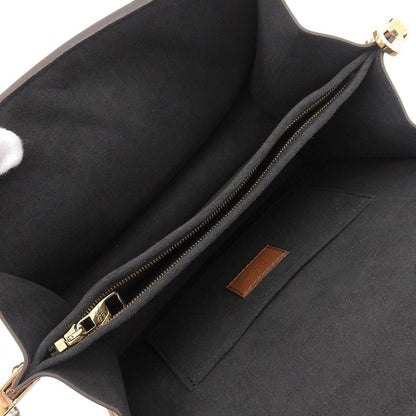 Louis Vuitton Monogram Reverse Dauphine PM Shoulder Bag
