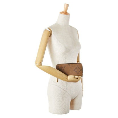 Louis Vuitton Monogram Giant Reverse Round Zipper Long Wallet M69353 Brown PVC