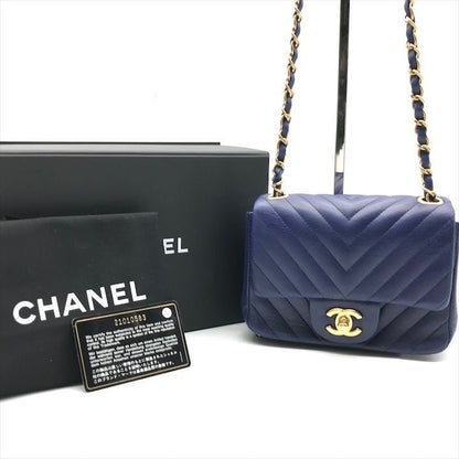 Chanel CC Logo Turnlock Mini Stitch Chain Shoulder Bag Blue