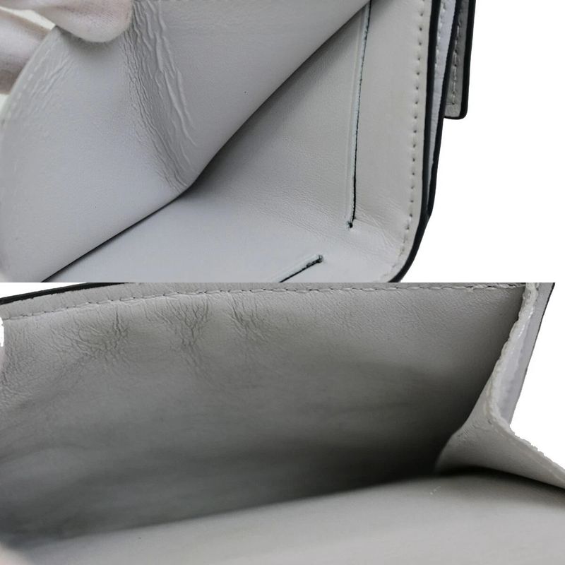 Louis Vuitton Trifold Wallet Taiga Llama Discovery Compact M67621 39fa050