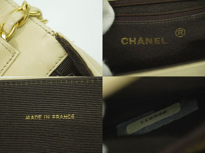 Authentic Chanel Coco Mark Chain Shoulder Bag Pochette Lambskin Leather Beige