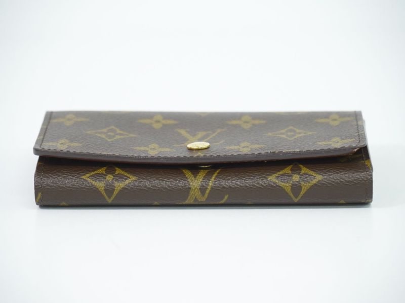 Authentic Louis Vuitton LV Porte Monet Vier Trésor Monogram Fold Wallet Brown