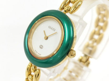 Gucci Ladies Watch Change Bezel Quartz SS GP White Dial