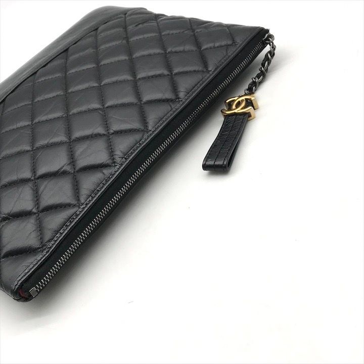 Chanel CC Logo Quilted Gabriel Lambskin Hand Clutch Black