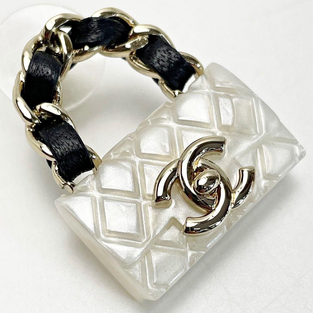 Chanel Earrings B23c Gold X White Bag Motif Coco Mark Matelasse Women's