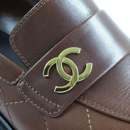 CHANEL 23A G45074 Coco Mark Matelasse Thick Soled Leather Loafers Brown Black