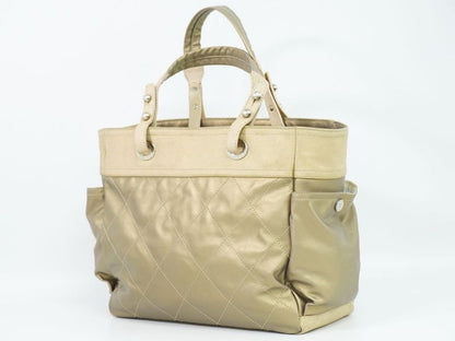 Authentic Chanel Coco Mark Paris Biarritz GM Tote Handbag Coated Canvas Gold