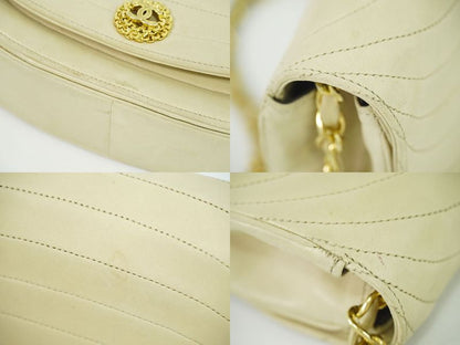 Authentic Chanel Coco Mark Chain Shoulder Bag Pochette Lambskin Leather Beige