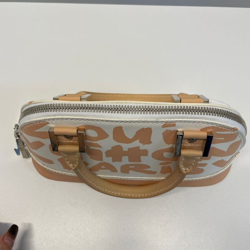 Louis Vuitton Alma Oriental Handbag