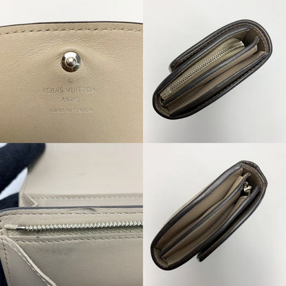 Louis Vuitton Mahina Portefeuille Iris Compact M62542 Beige Bifold Wallet