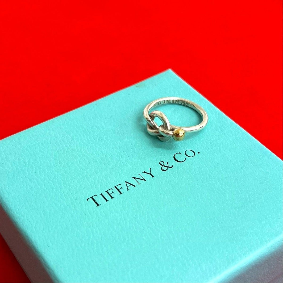Tiffany & Co Hook Eye Love Knot 18K Gold Ring Silver