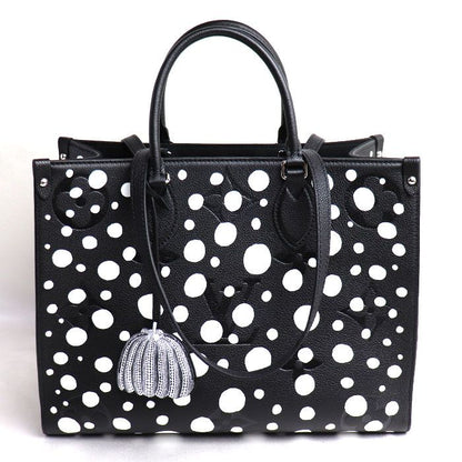 Louis Vuitton On The Go MM Yayoi Kusama Tote Bag Empreinte Black White M46389