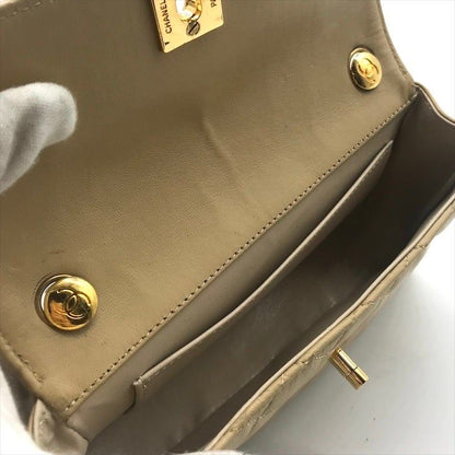 Chanel CC Logo Mini Quilted Turnlock Shoulder Bag Beige