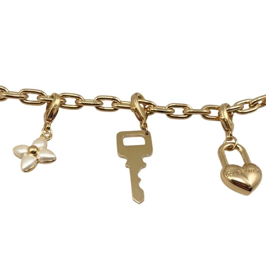 Louis Vuitton Bag Charm - LV Charm M02943 Monogram - Flower Padlock Gold Louis