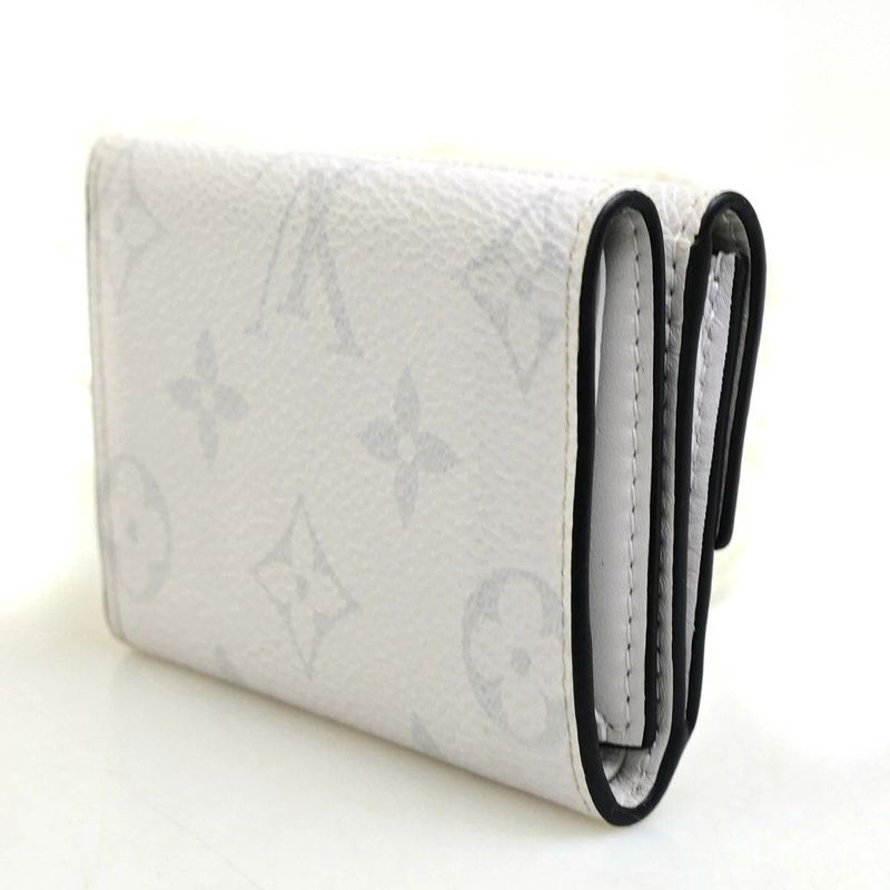 Louis Vuitton Trifold Wallet Taiga Llama Discovery Compact M67621 39fa050