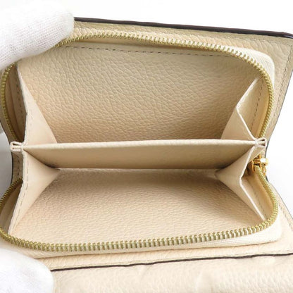 Louis Vuitton Monogram Empreinte M81071 Folding Wallet