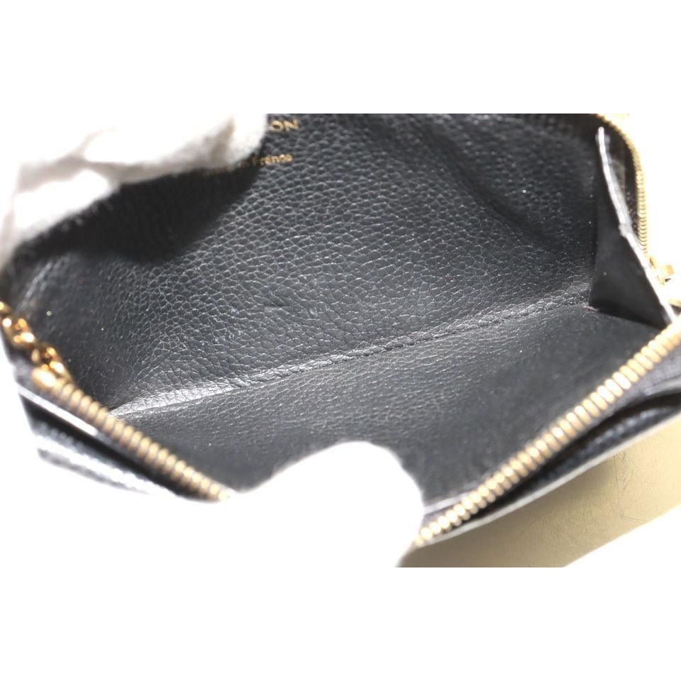 Louis Vuitton Monogram Empreinte Porto Caltrect Verso Leather Zip Around Coin — view 6