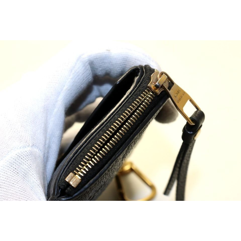 Louis Vuitton Monogram Empreinte Porto Caltrect Verso Leather Zip Around Coin — view 7