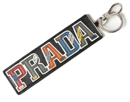 Prada Key Ring Key Holder Bag Charm Prada Logo Patchwork Caracter NERO M Never