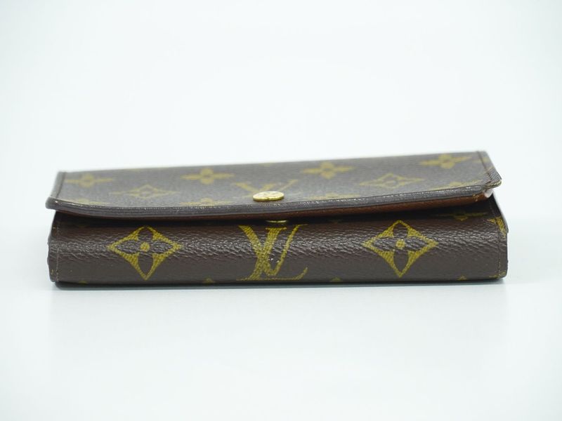 Authentic Louis Vuitton LV Porte Monet Vier Trésor Monogram Fold Wallet Brown