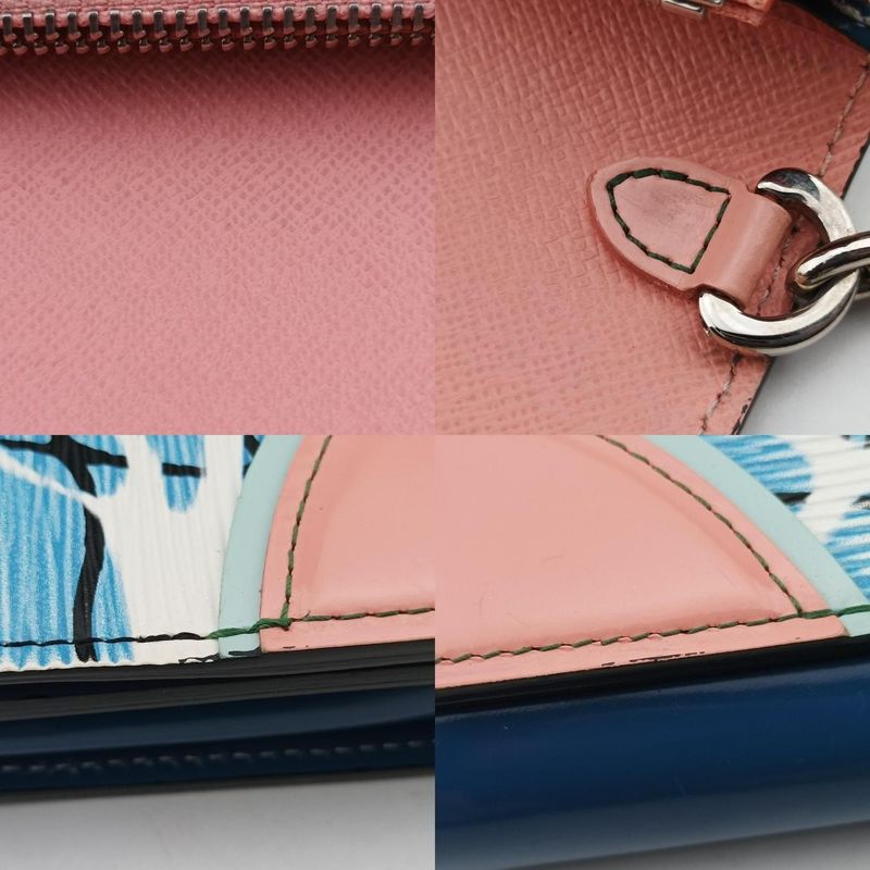 Louis Vuittonportefeuille Twisted Blue And Multicolor Epi M56237 Sp4135