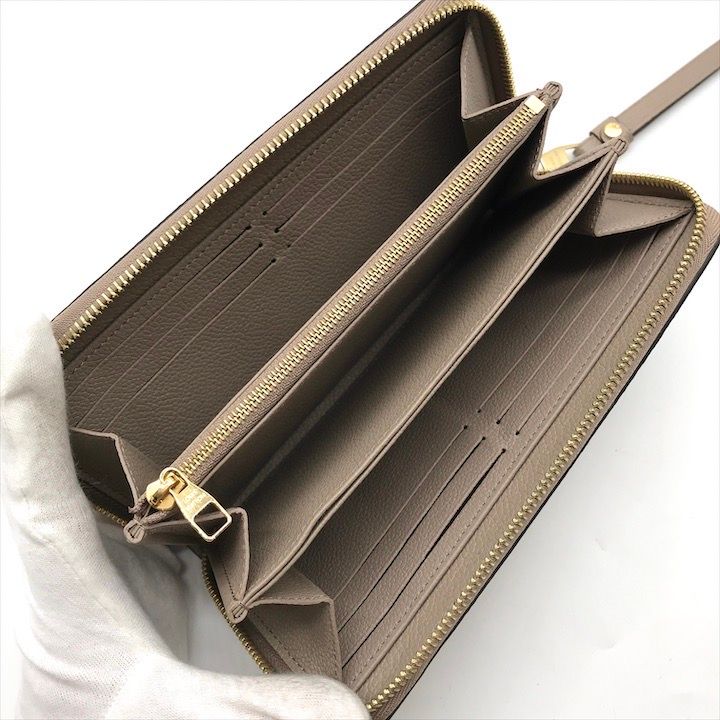 Louis Vuitton Empreinte Zippy Wallet Beige