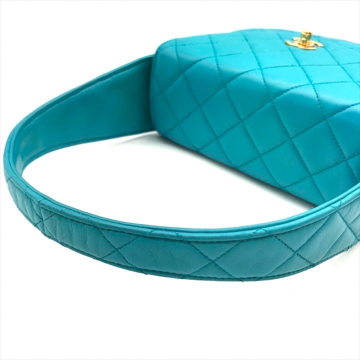 Chanel CC Logo Turnlock Quilted Lambskin Mini Hand Vanity Bag Blue