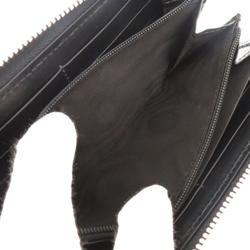 Gucci GG Embossed 625558 Black Round Zipper Long Wallet Black 1335 Gucci