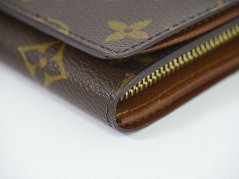 Authentic Louis Vuitton LV Porte Monet Vier Trésor Monogram Fold Wallet Brown
