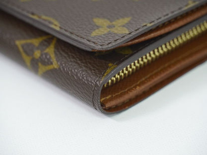 Authentic Louis Vuitton LV Porte Monet Vier Trésor Monogram Fold Wallet Brown