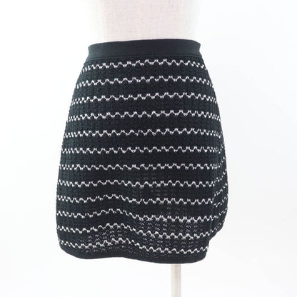 CHANEL P49277 Trapezoidal Wrap Skirt With Coco Mark Buttons Black White 34 Made