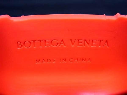 Bottega Veneta Intrecciato Rubber Airpods Case Airpods Case In Orange