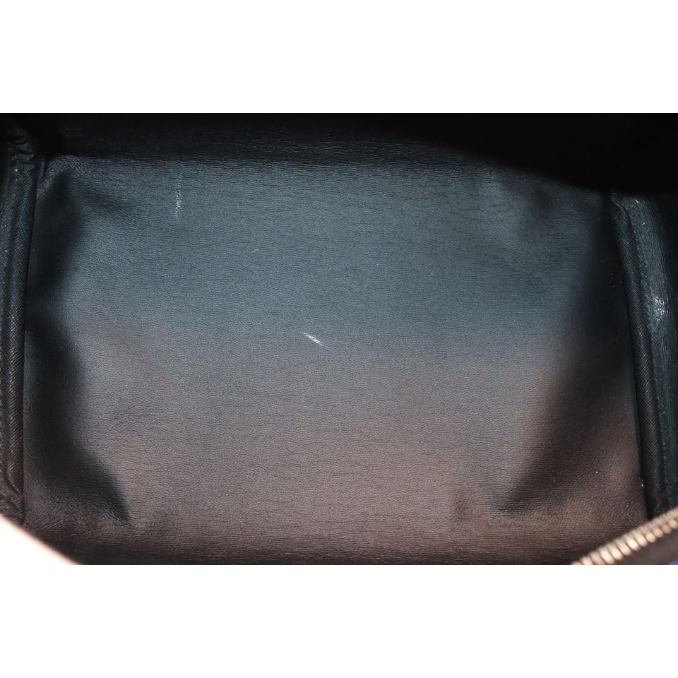 Louis Vuitton Taigarama Dopp Kit Leather Second Bag — view 7