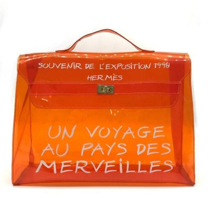 Hermes Vinyl Kelly Clear Handbag Orange