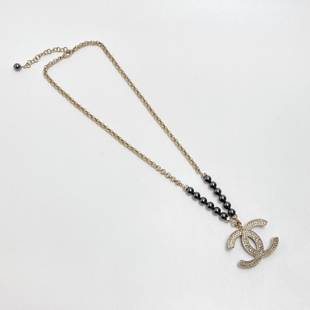 Chanel Coco Mark Rhinestone X Fake Pearl Necklace C23p Champagne Gold/black