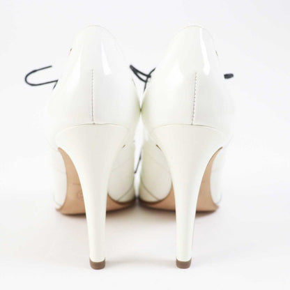 CHANEL 17A G33057 Lace-up Patent Leather Booties With Coco Mark White Gold