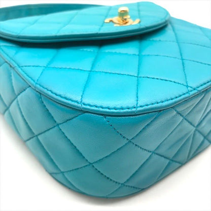 Chanel CC Logo Turnlock Quilted Lambskin Mini Hand Vanity Bag Blue
