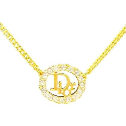Christian DIOR Necklace Rhinestone Vintage Round Logo Gold