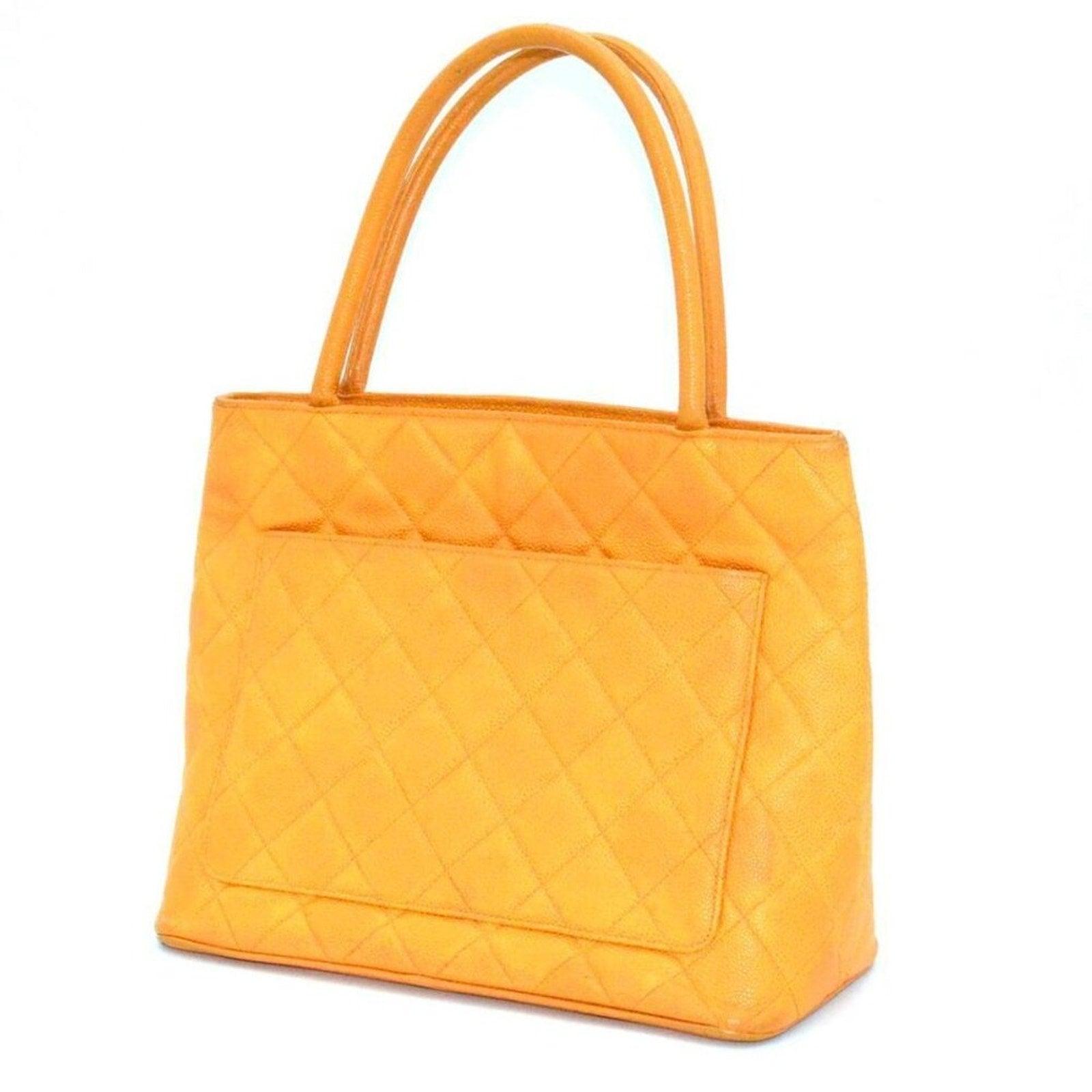 Authentic Chanel Caviar Leather Medallion Tote Quilted Shoulder Bag Orange - The Reluxe