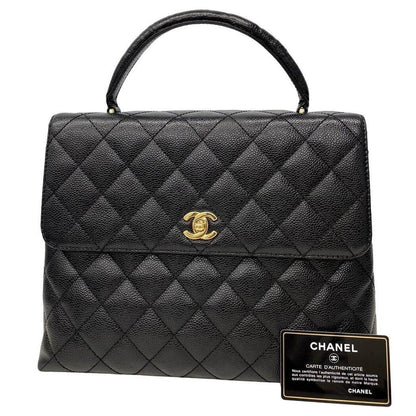 Authentic CHANEL CC Caviar Vertical Quilted Kelly Flap Bag Black Purse Handle - The Reluxe