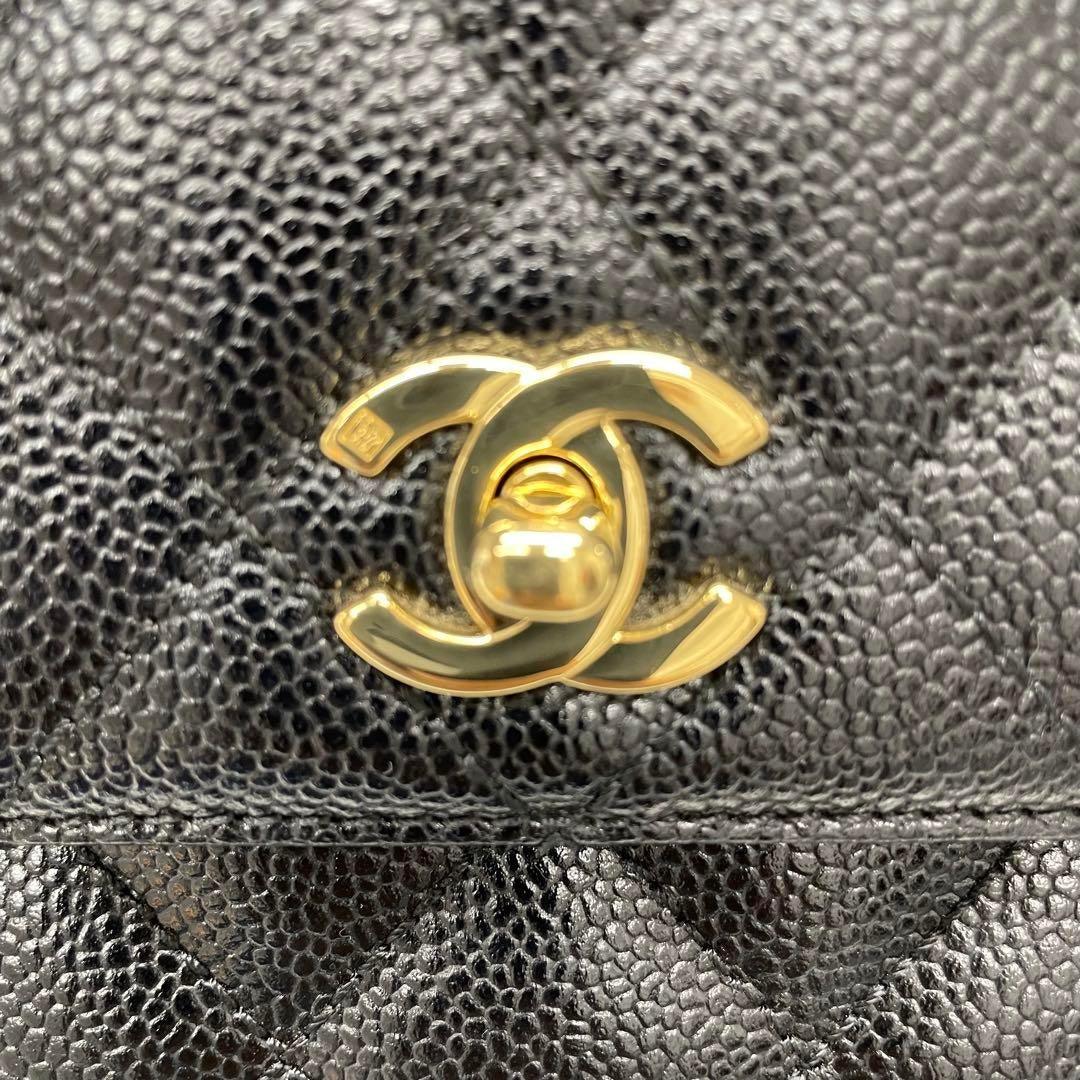 Authentic CHANEL CC Caviar Vertical Quilted Kelly Flap Bag Black Purse Handle - The Reluxe