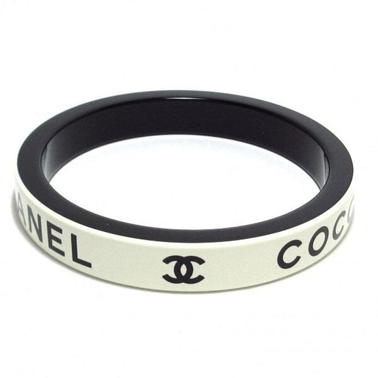 Authentic CHANEL CC Coco Logo Vintage Bracelet Cuff Bangle White Black - The Reluxe