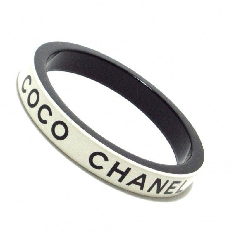 Authentic CHANEL CC Coco Logo Vintage Bracelet Cuff Bangle White Black - The Reluxe