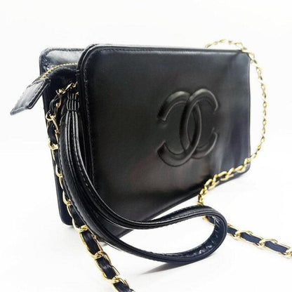 Authentic CHANEL Classic Timeless Wristlet Clutch Pouch Lambskin Leather Black - The Reluxe