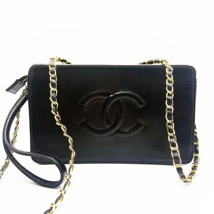 Authentic CHANEL Classic Timeless Wristlet Clutch Pouch Lambskin Leather Black - The Reluxe